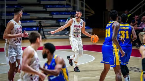 stojanovic carries the ball in FMP SoccerBet vs Peristeri Domino's of the Basketball Champions League
